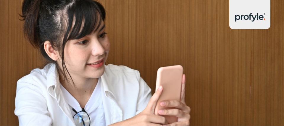 A woman scanning a QR code